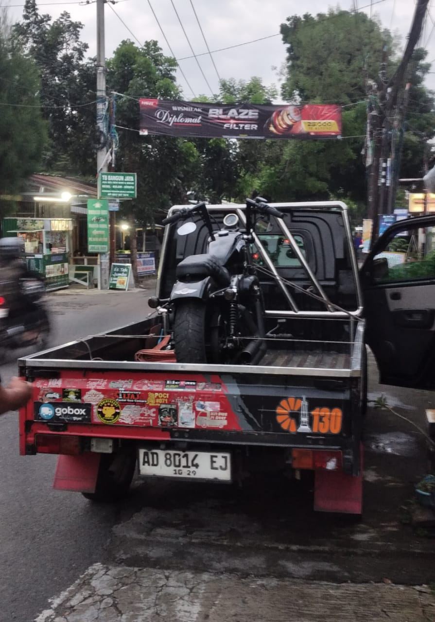 Angkut motor untuk servis atau pindah kota